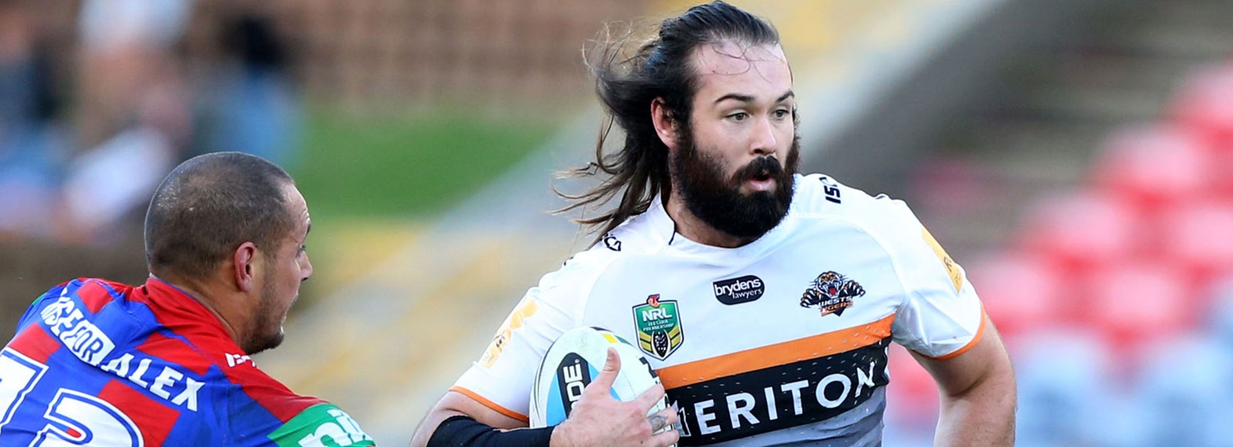 Wests Tigers prop Aaron Woods takes a hit-up against the Knights in Round 10.