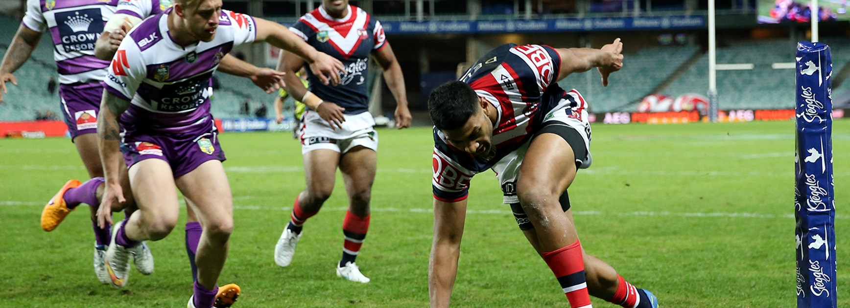 Daniel Tupou scores for the Roosters in the corner against the Storm in Round 12.