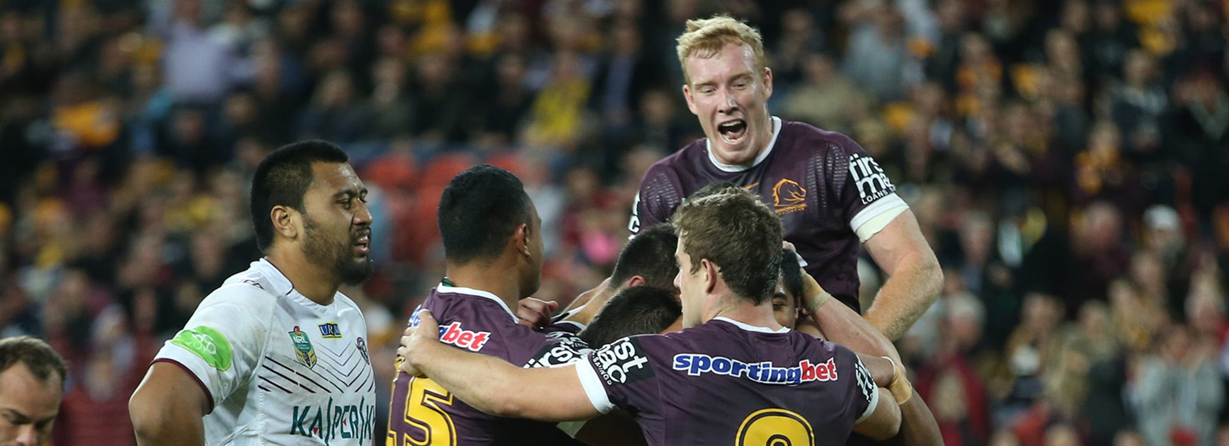 The Broncos celebrate a try against Manly at Suncorp Stadium in Round 13.