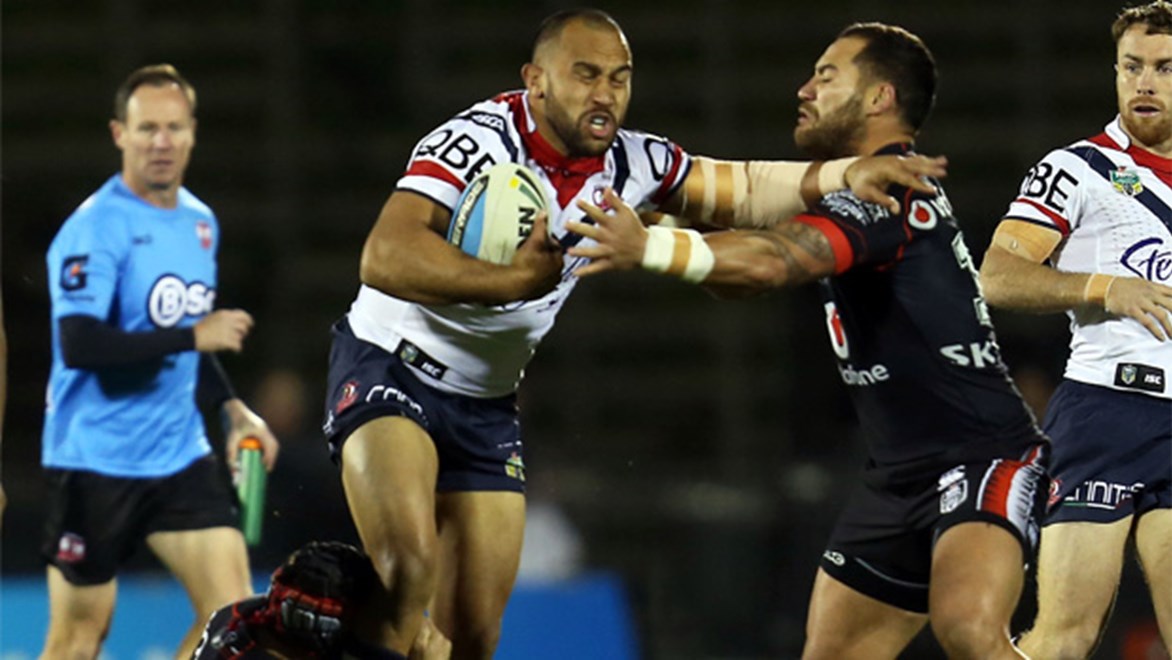 Sam Moa takes a hit-up for the Roosters against the Warriors in Round 14.