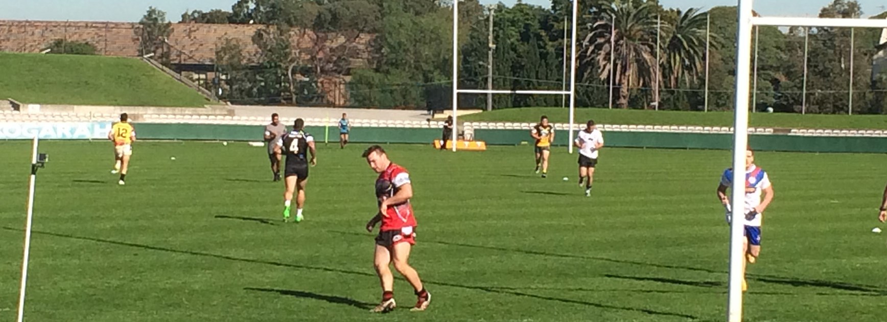 The NRL Rookie candidates are put through 100 metre sprinting drills.