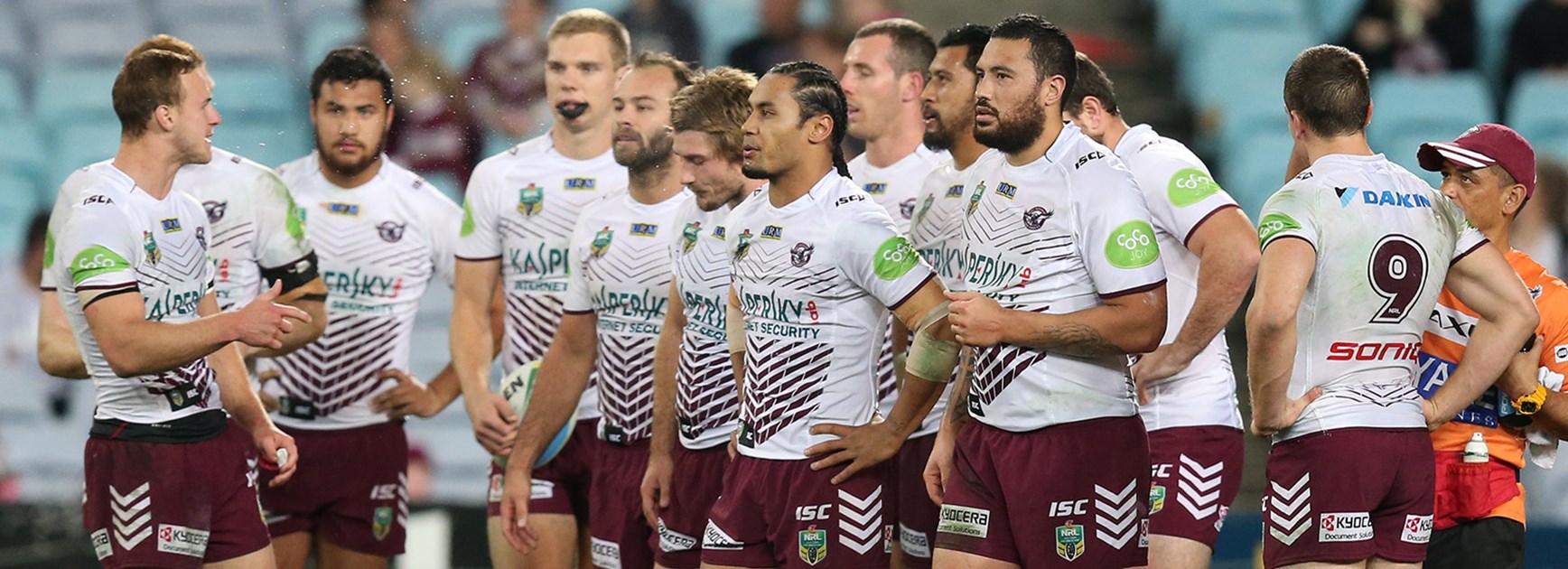 Manly players look on after conceding a try to the Rabbitohs at ANZ Stadium.
