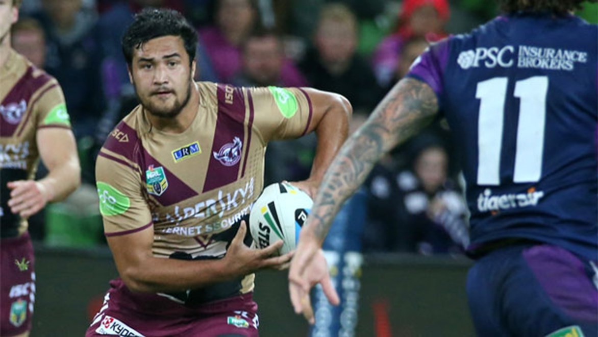 Manly's Peta Hiku takes on the Melbourne defence on Anzac Day.