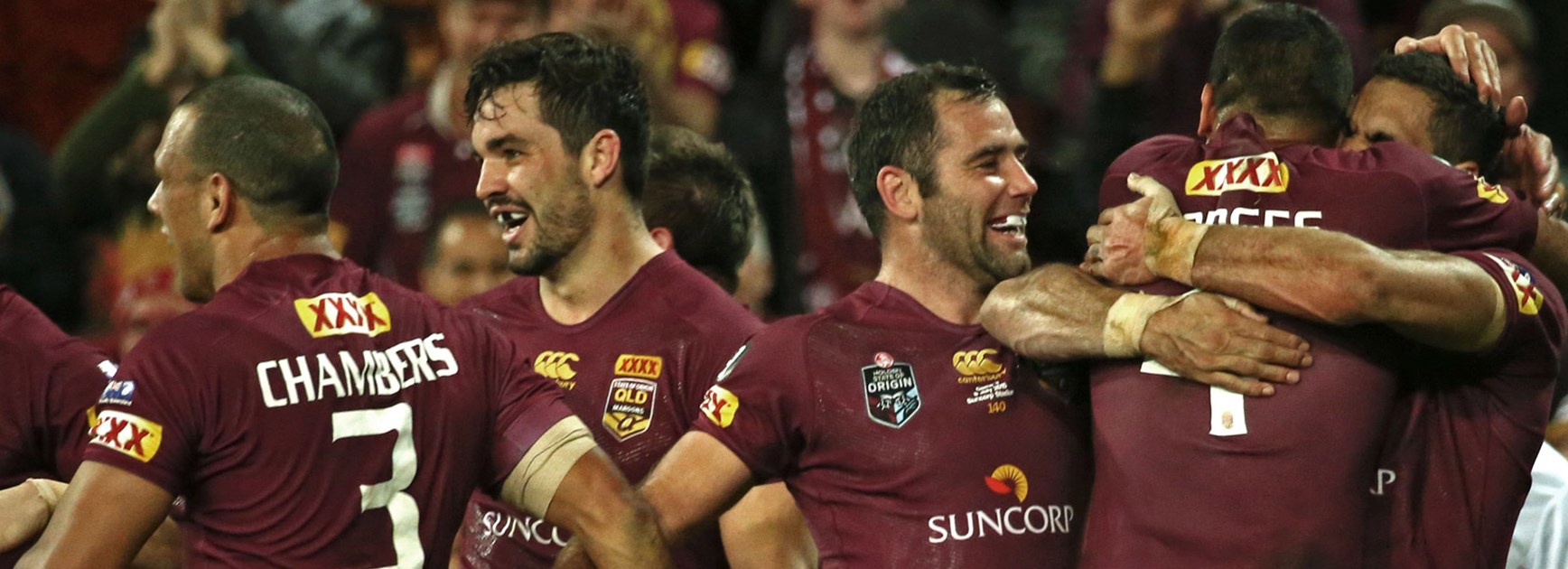 Queensland players celebrate during Game Three of the 2015 Origin series.