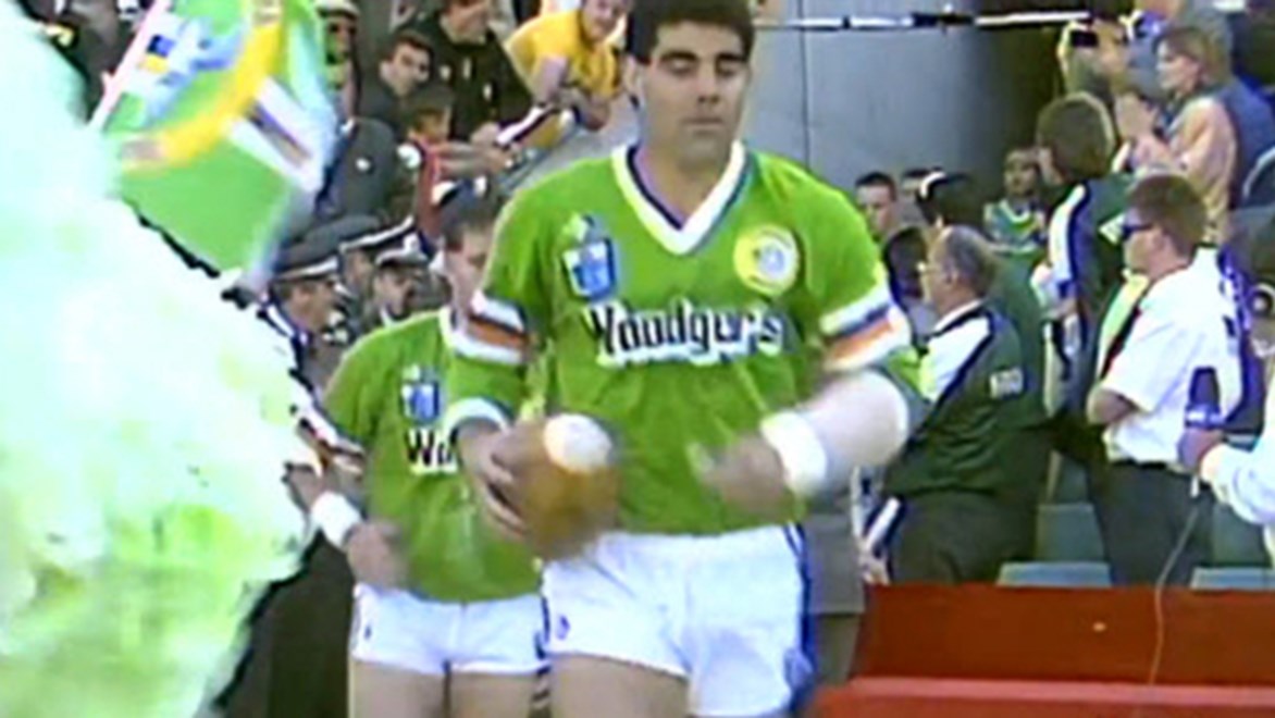 A young Mal Meninga leads the Canberra Raiders out.