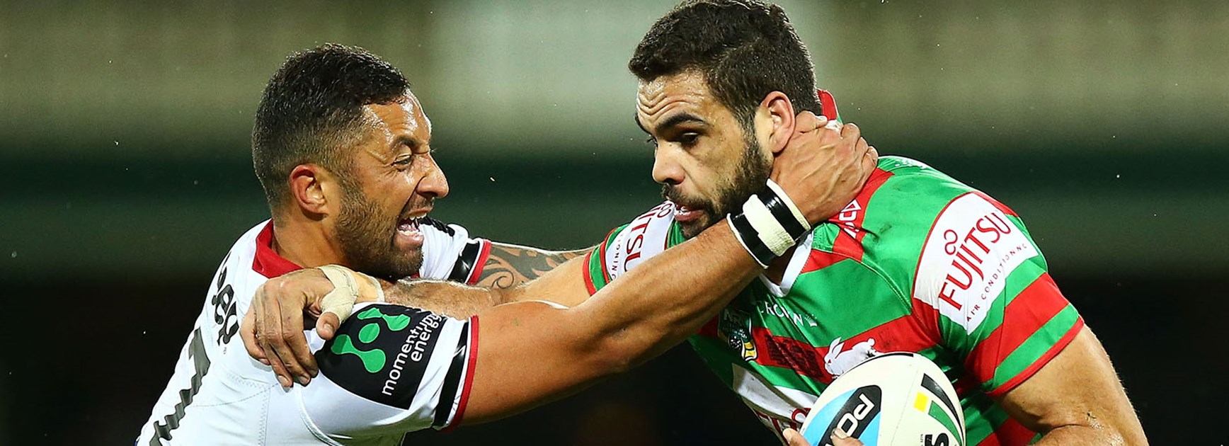 Greg Inglis is tackle by Benji Marshall at the SCG.
