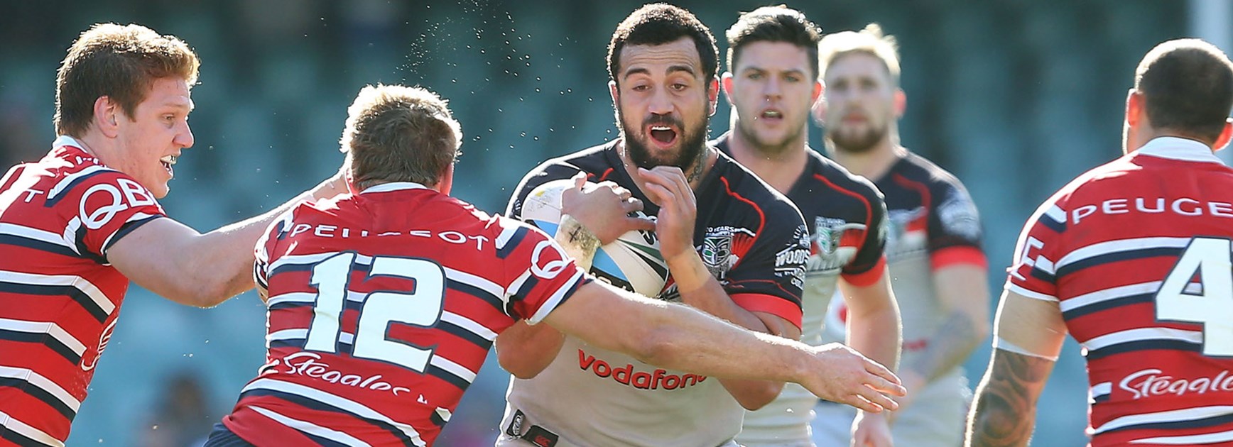 Warriors prop Ben Matulino charges into the Roosters defence at Allianz Stadium.