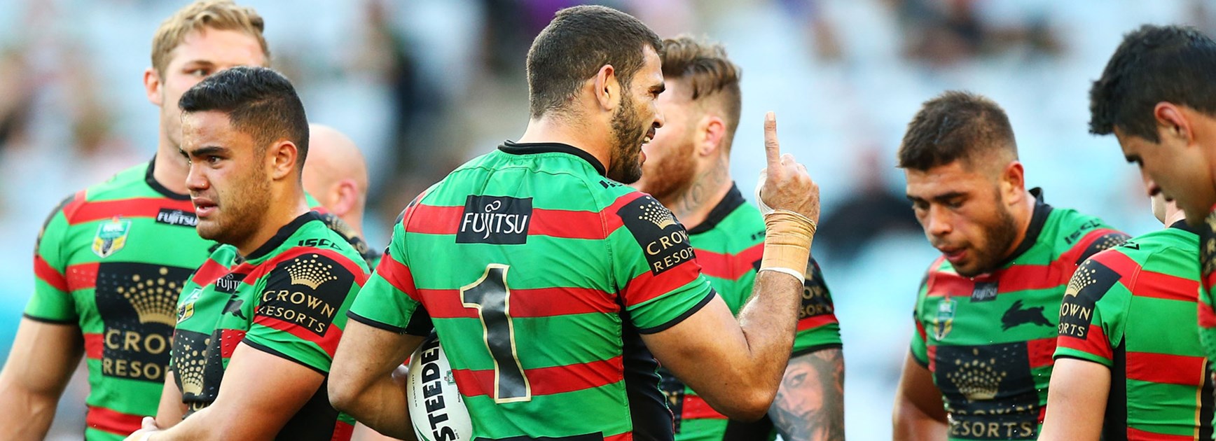 Greg Inglis addresses his teammates during his 100th game in South Sydney colours.