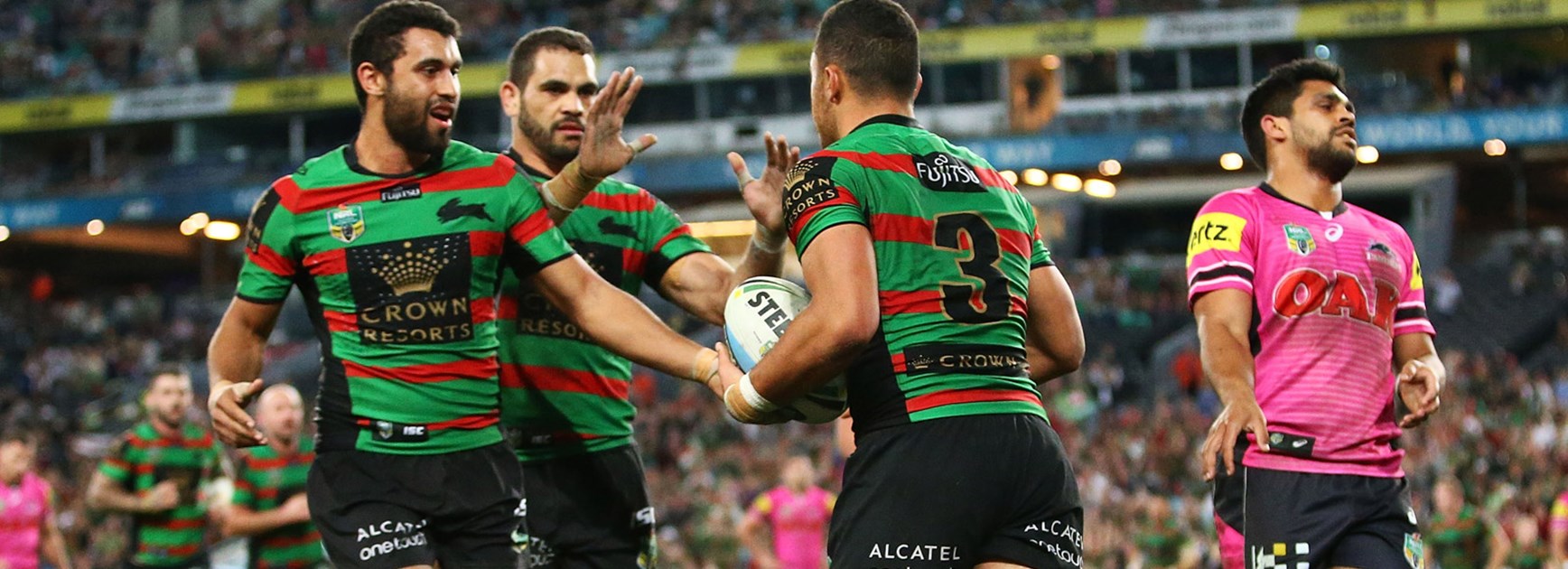 Souths players celebrate Dylan Walker's try against the Panthers in Round 21.
