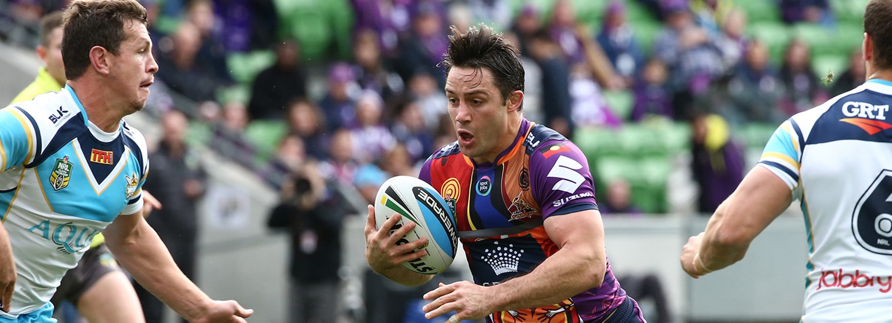 Cooper Cronk makes a run against the Titans in Round 22.