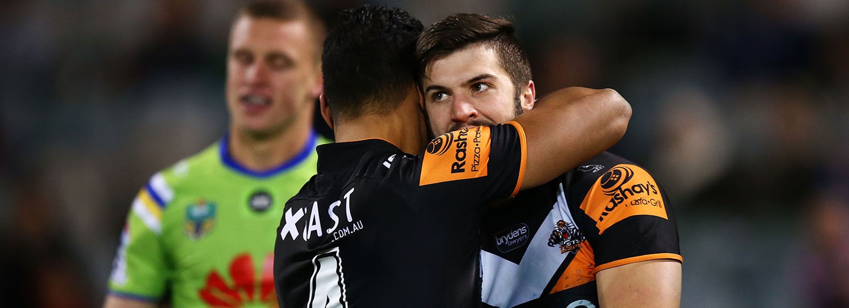 James Tedesco celebrates a try against the Raiders in Canberra.