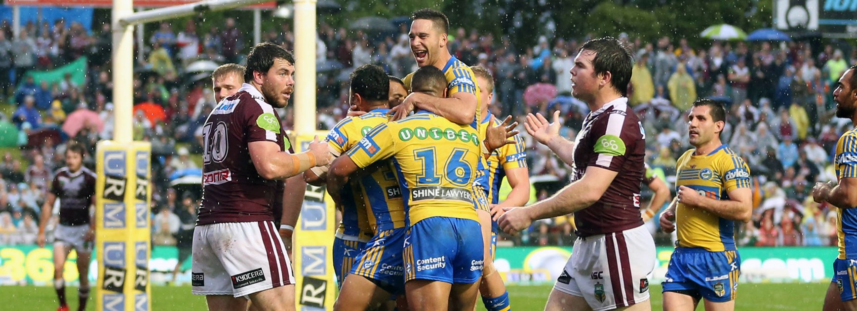 Eels players celebrate during their Round 24 meeting with the Sea Eagles.