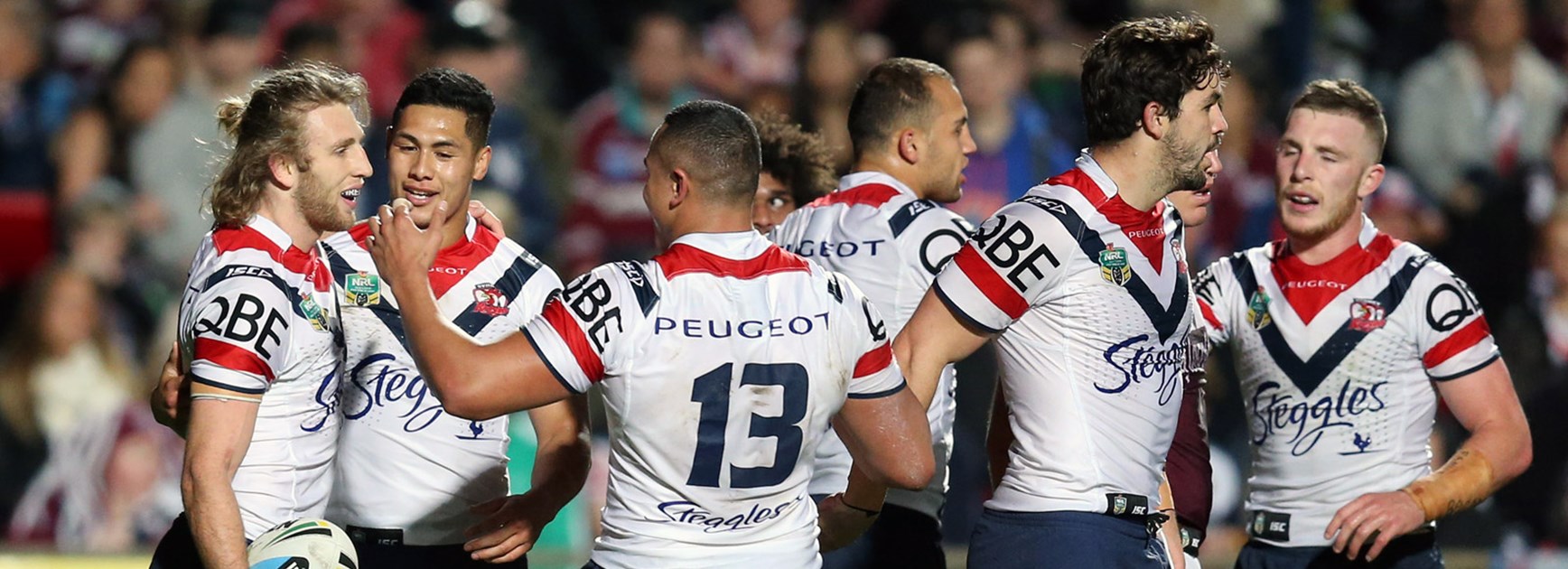 Roosters players celebrate during their Round 25 win over the Sea Eagles.
