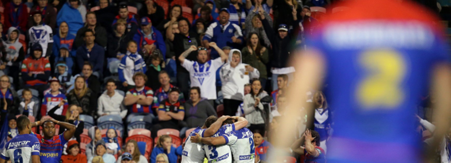 The Bulldogs celebrate a try against Newcastle at Hunter Stadium on Saturday night.
