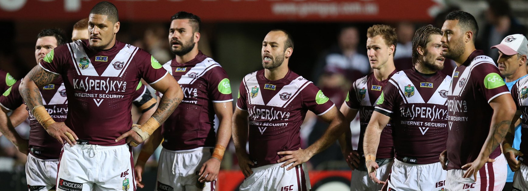 Manly players look on dejected during their loss to the Tricolours.