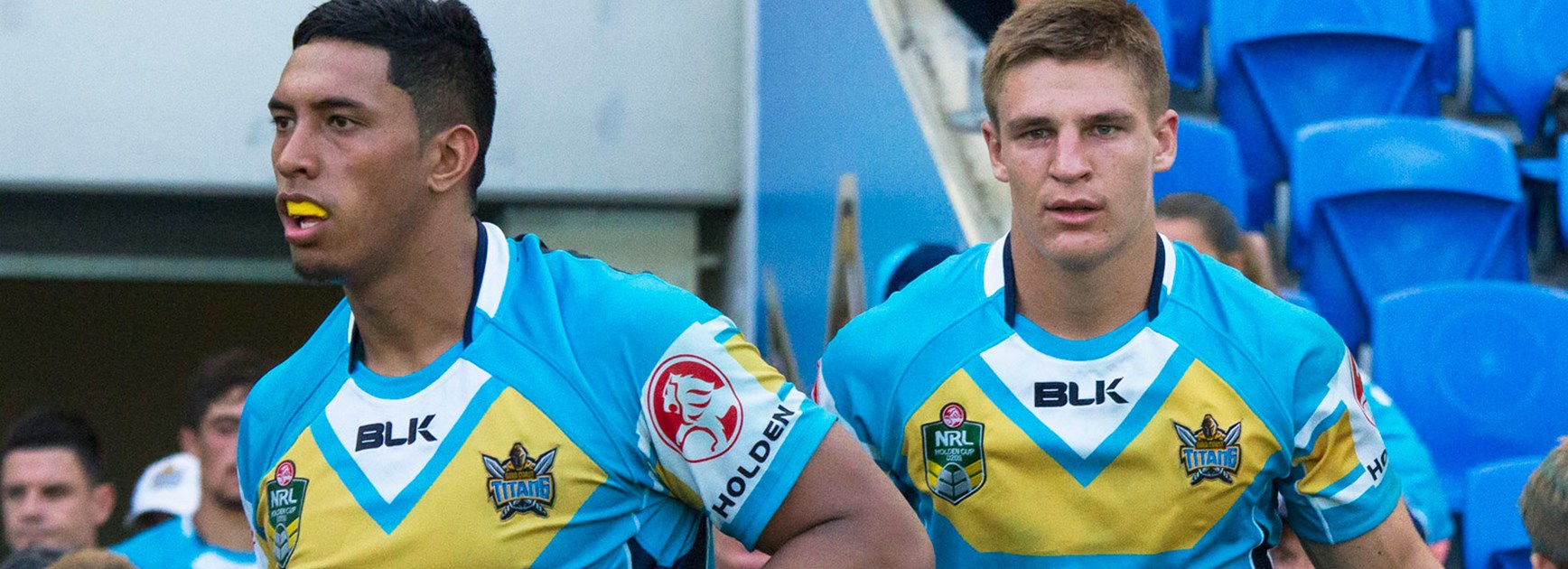 Star Holden Cup players Oshae Tuiasau and Jed Cartwright have both re-signed with the Titans.