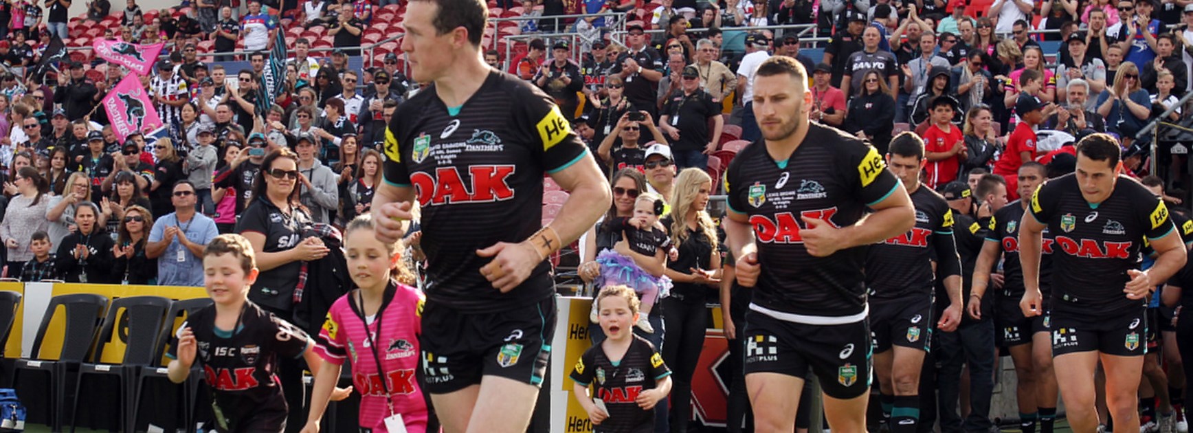 David Simmons leads the Panthers out for his final NRL game on Saturday.