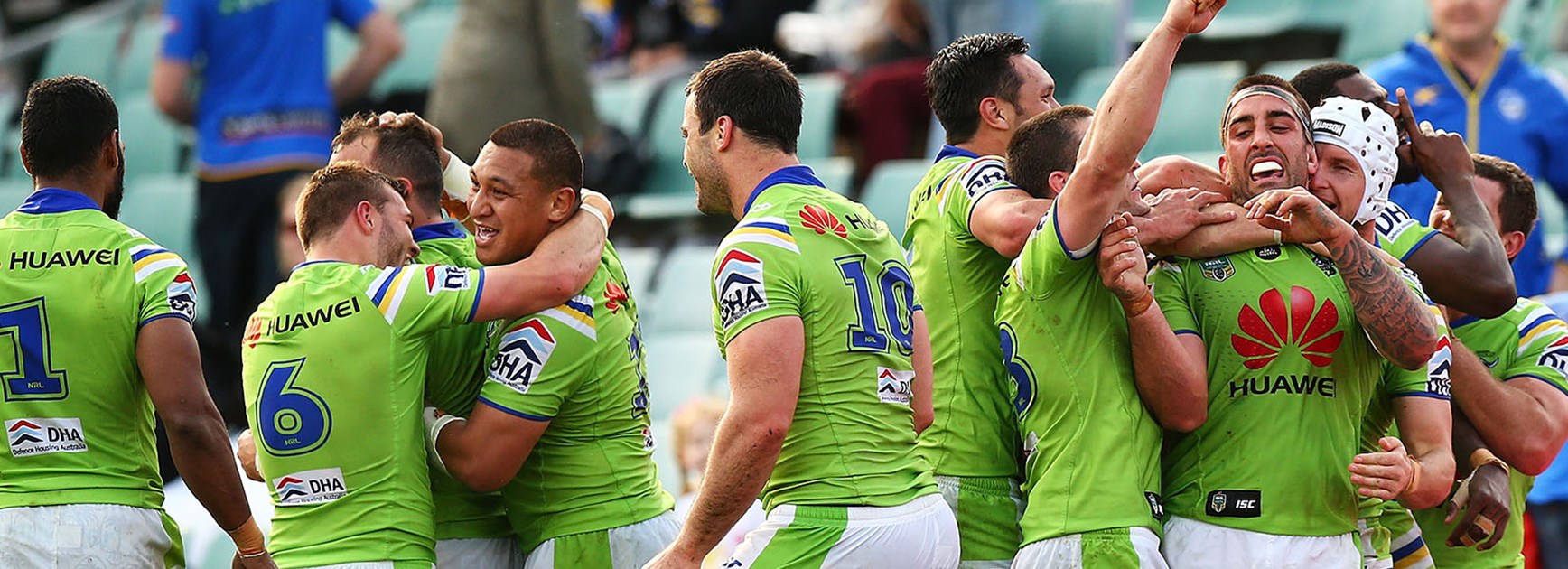 Canberra players celebrate their golden point win over the Eels in Round 26 at Pirtek Stadium.