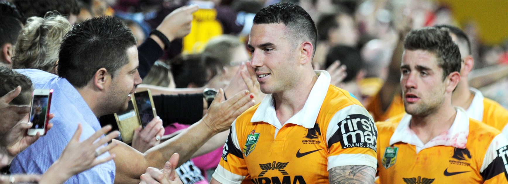 Darius Boyd with Broncos fans after booking a place in the NRL Grand Final with a win over the Roosters.