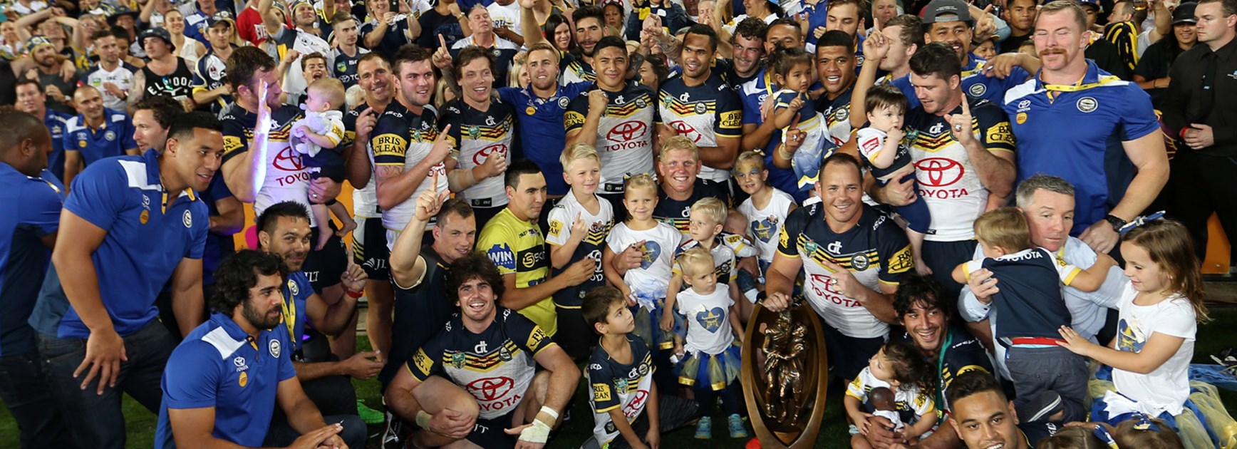 Cowboys players celebrate their first premiership with their fans at ANZ Stadium.