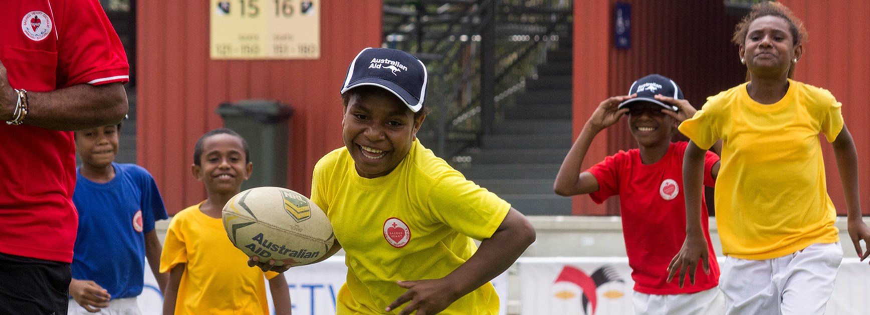 Rugby League-themed program is improving community attitudes towards girls and women, especially in schools.