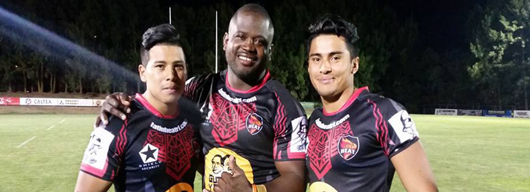 Four-try hero Kevin McKenzie (centre) with Latin Heat debutants Michael and Alvaro Alarcon after their win over Thailand last weekend.