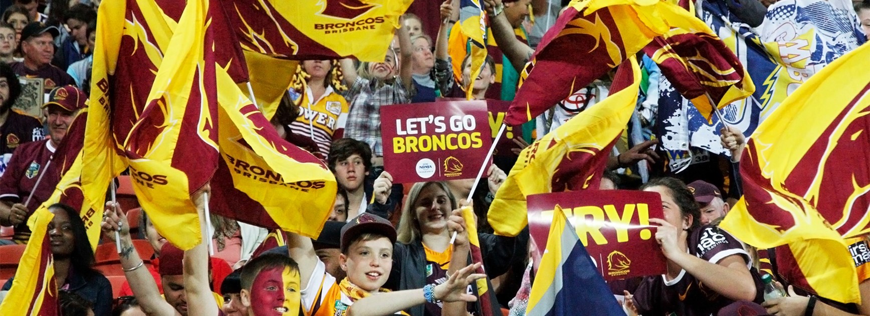 Broncos and Cowboys fans during the 2015 NRL Grand Final.