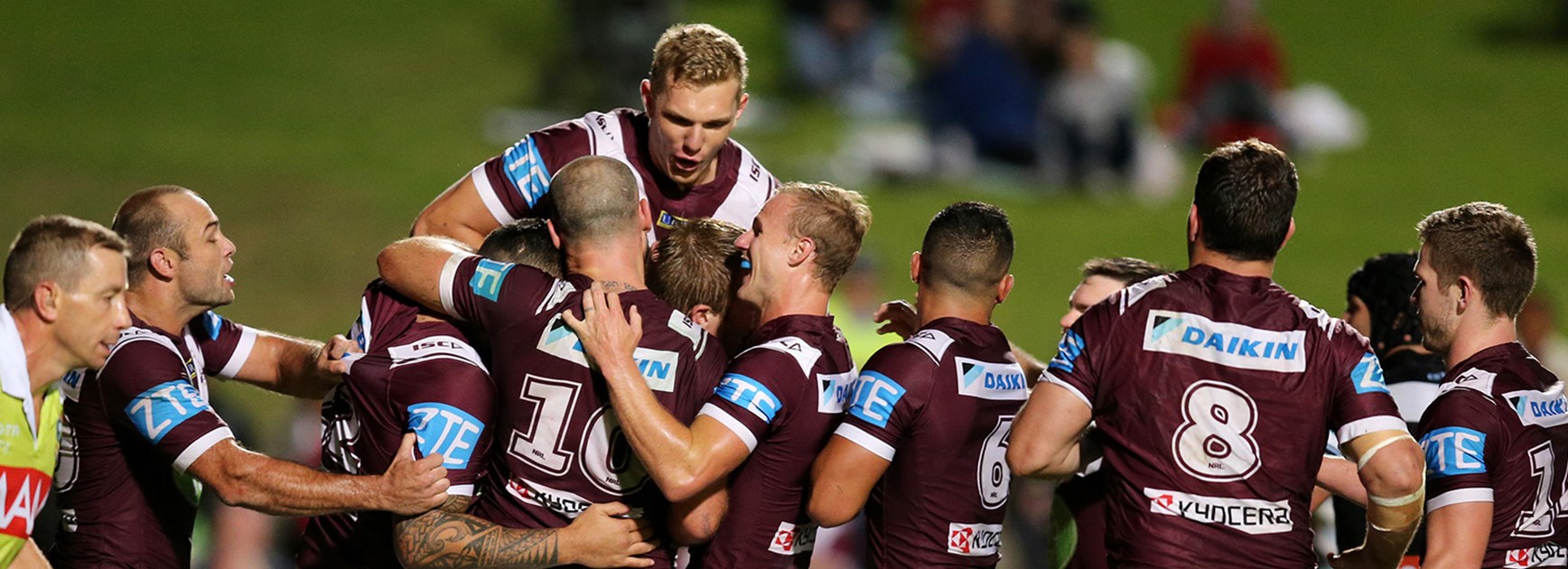 Manly celebrates their first win of the season, with victory over the Sharks at Brookvale Oval.