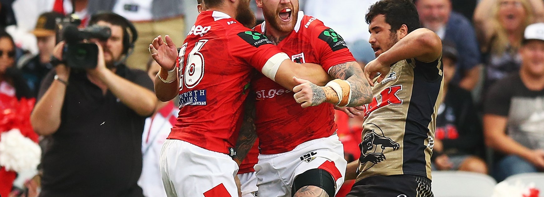 Josh Dugan celebrates his try against the Panthers in Round 4.