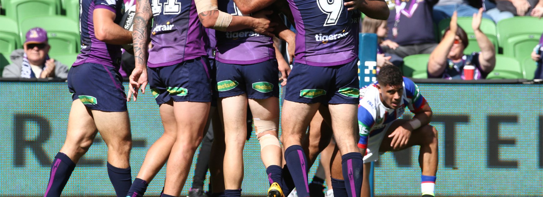 The Melbourne Storm celebrate Cooper Cronk's first-half try against Newcastle on Saturday.
