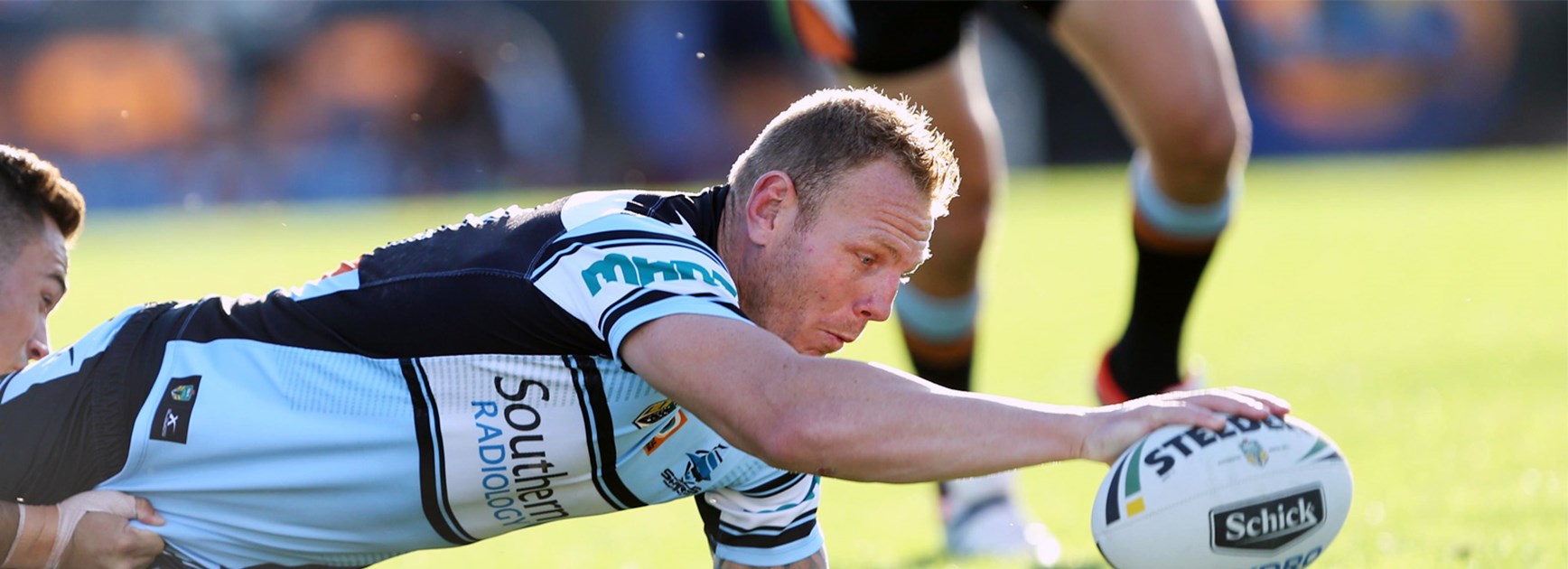Luke Lewis gave Cronulla the perfect start with a try in the opening minutes against the Tigers.