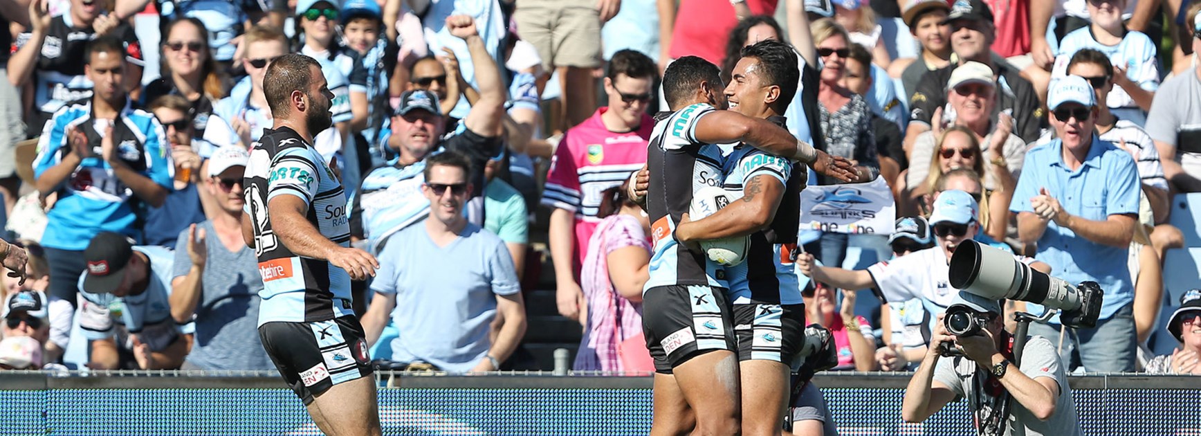 Sharks players celebrate during their win over the Titans in Round 6.