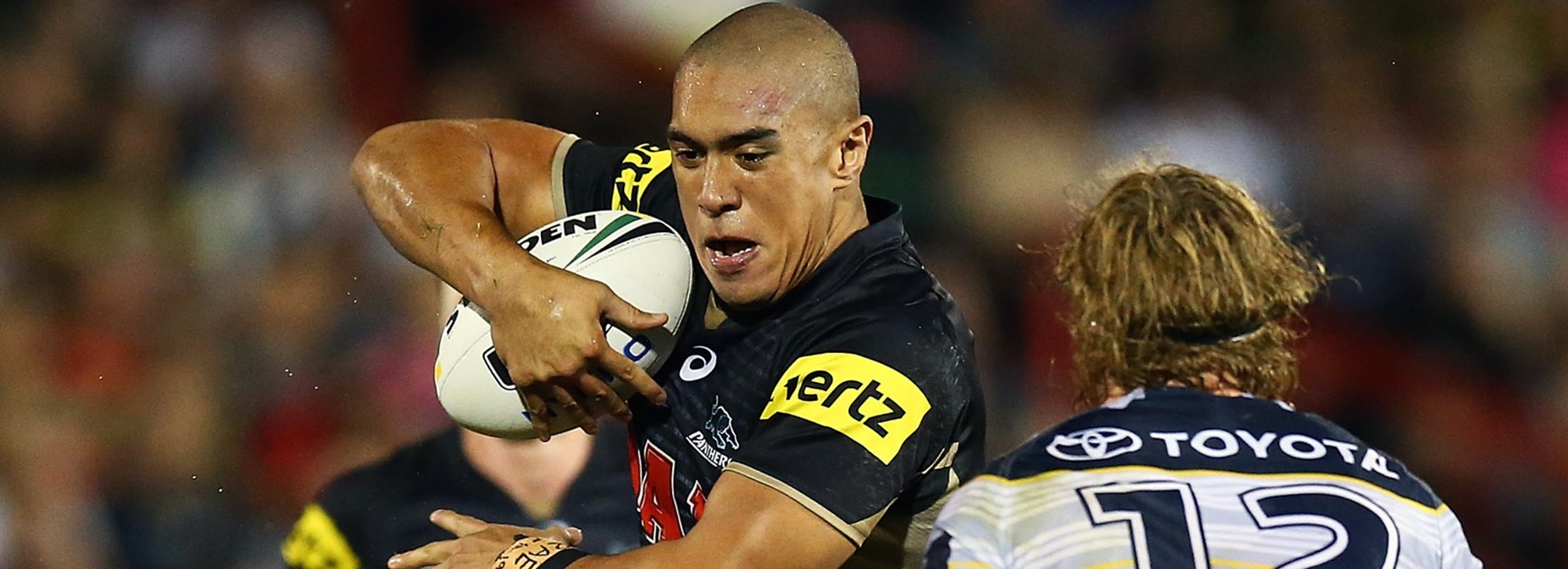 Panthers forward Leilani Latu charges into the Cowboys defence.