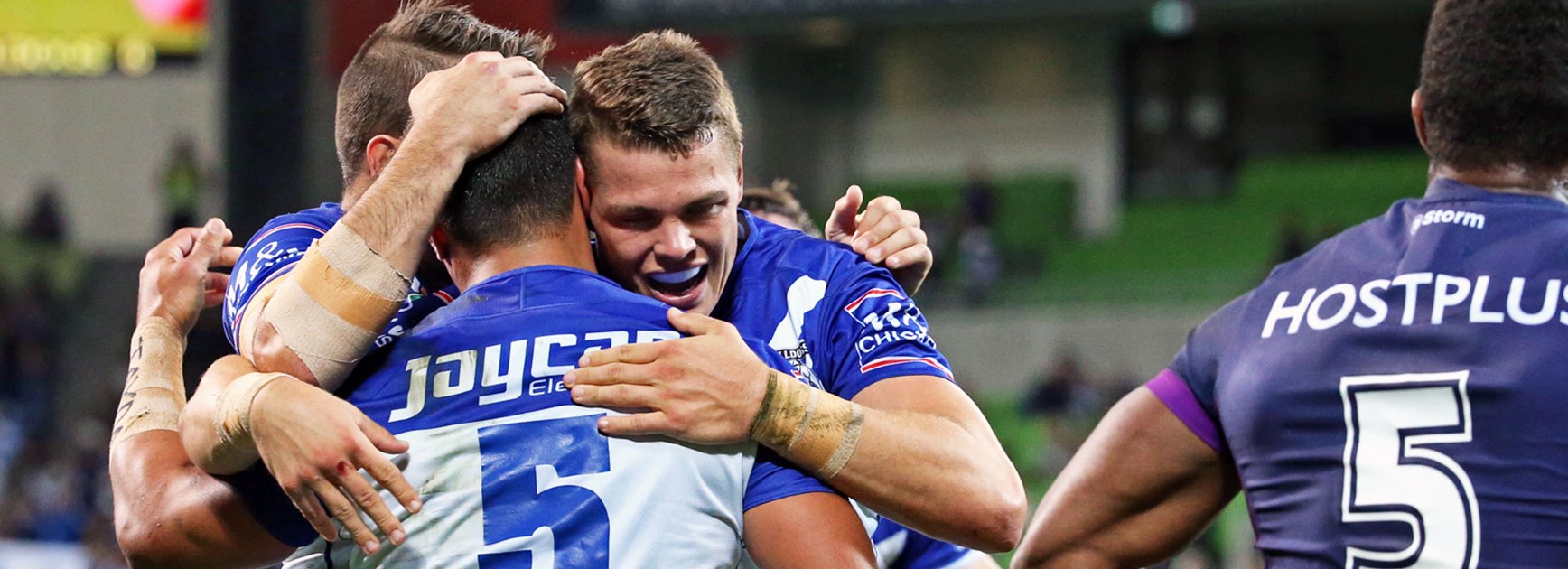 Bulldogs players celebrate against the Storm in Round 6.