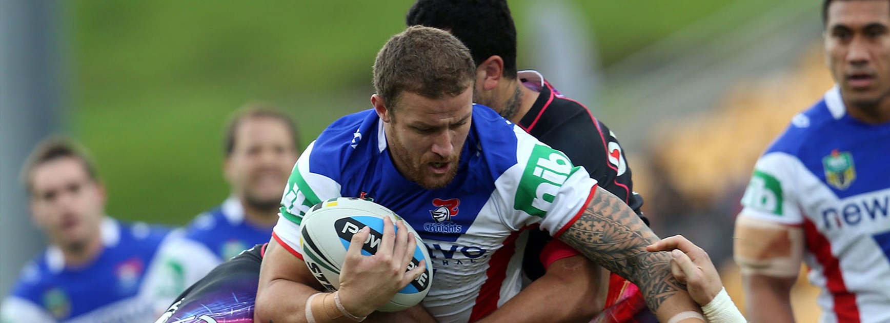 Korbin Sims is tackled by the Warriors at Mt Smart Stadium in Round 12.
