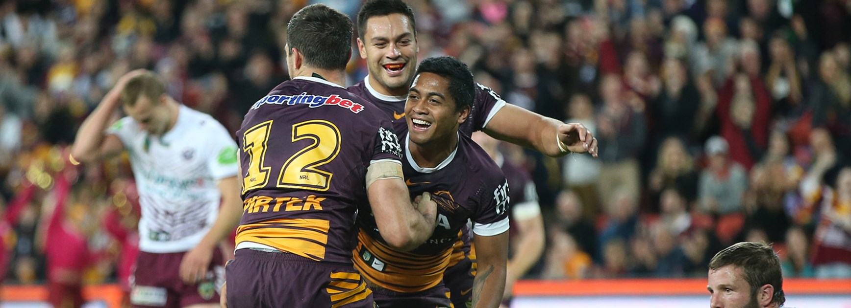 Brisbane celebrates Anthony Milford's try against Manly at Suncorp Stadium in Round 13.