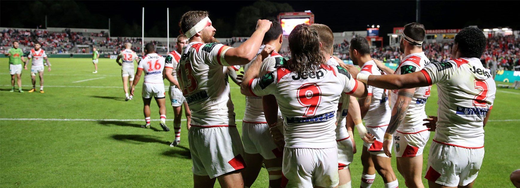 The Dragons celebrate Euan Aitken's match-winning try against Canberra in Round 10.
