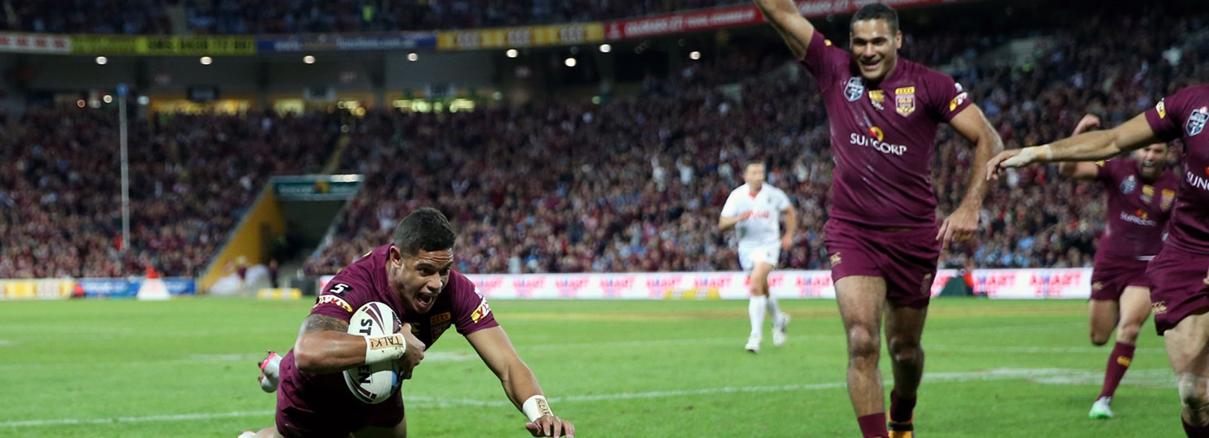 Justin Hodges watches on as Dane Gagai crosses for a try in Origin III, 2015.