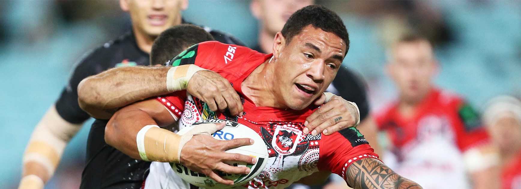 Tyson Frizell is wrapped up by the Rabbitohs defence on Thursday night.