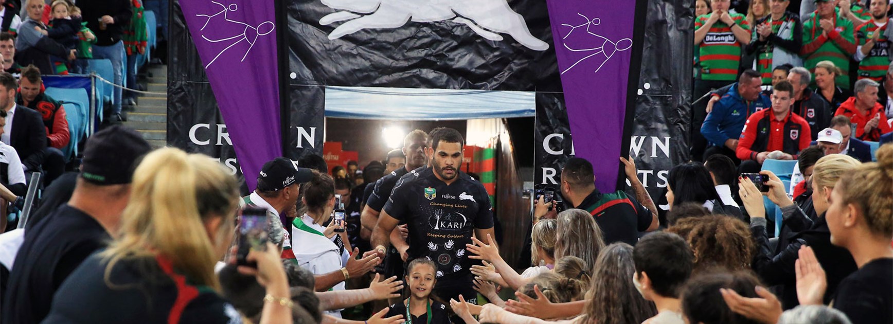 Greg Inglis leads the Rabbitohs out in their Indigenous-themed jerseys in Round 11.