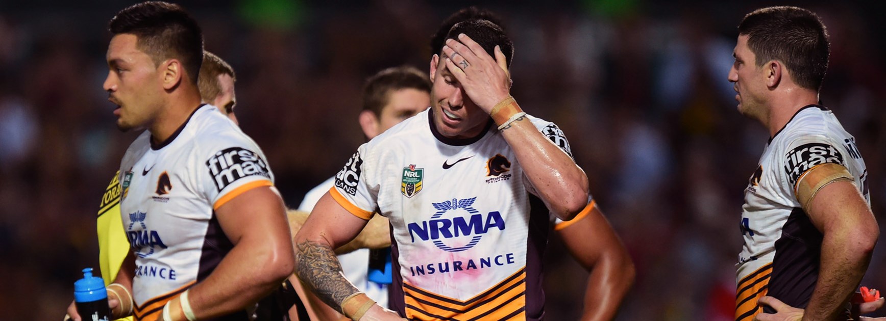 Broncos players during their Round 11 loss to the Cowboys at 1300SMILES Stadium.
