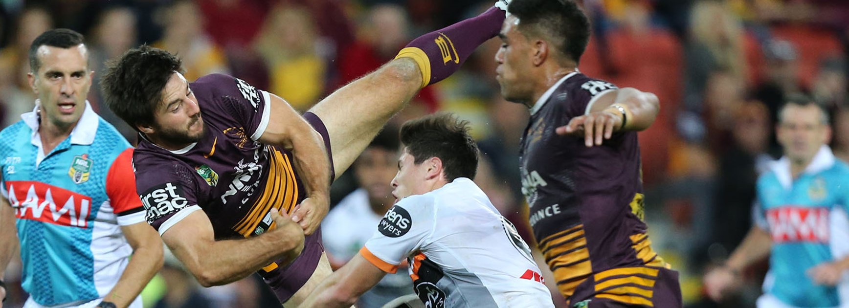 Ben Hunt comes up with a spectacular try saving play on Mitch Moses at Suncorp Stadium.