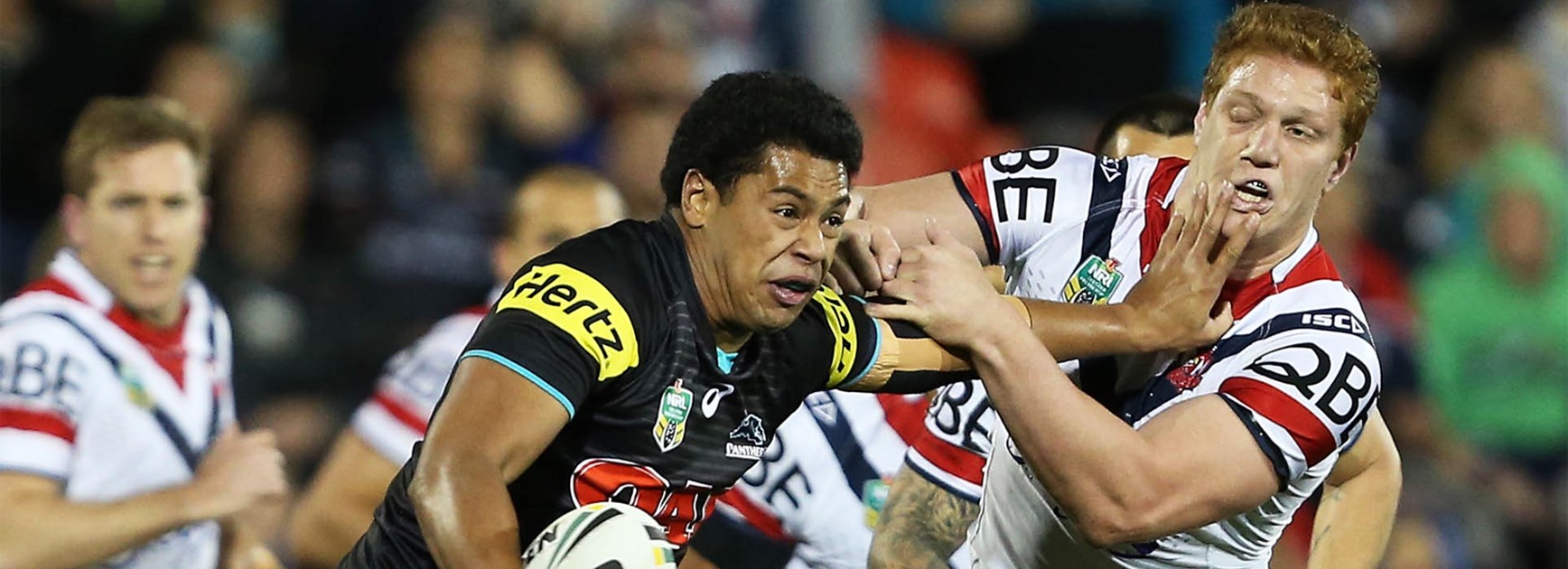 Waqa Blake brushes out of a Dylan Napa tackle during the Panthers' clash with the Roosters on Saturday.