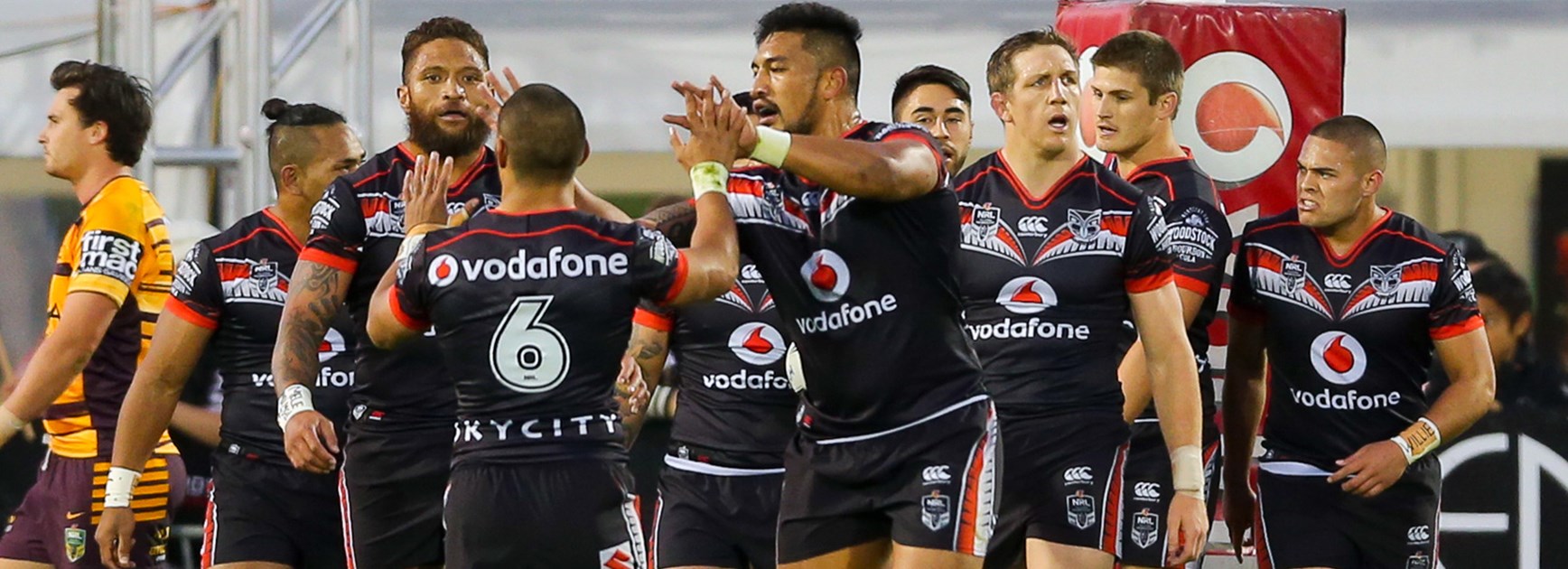Warriors players celebrate during their win over the Broncos.