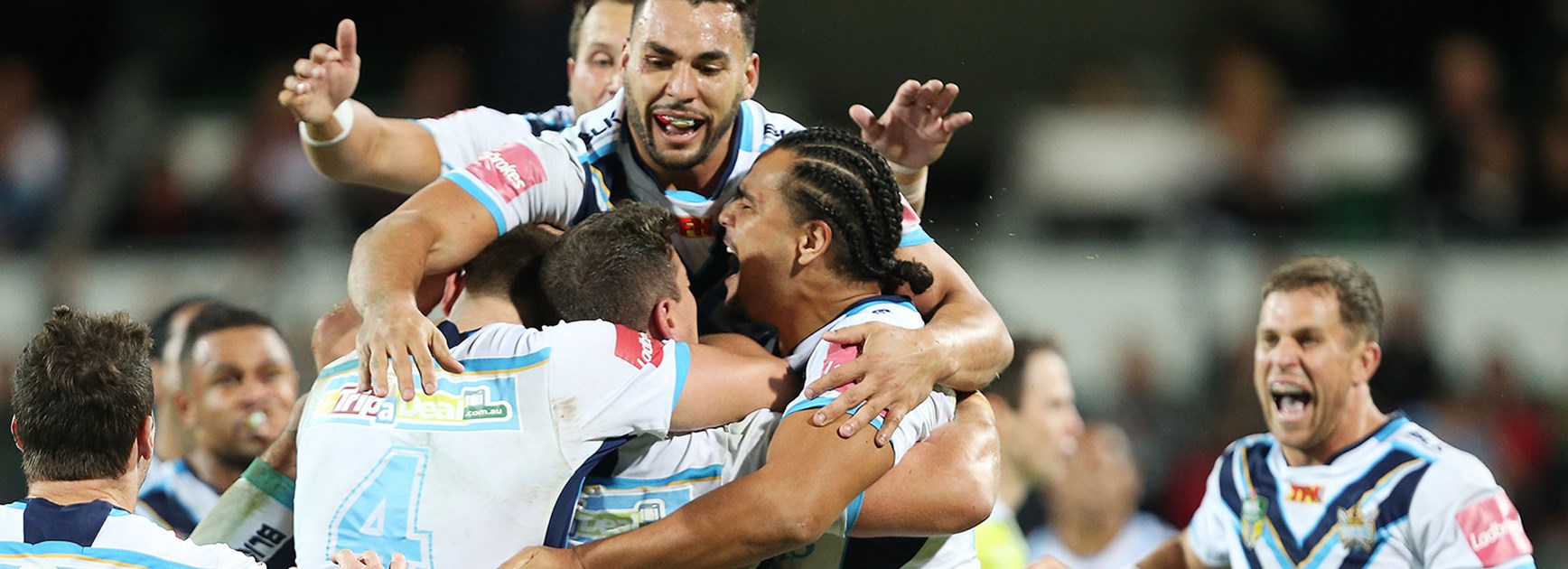 The Titans celebrate Ashley Taylor's match winning field goal in golden point in Perth.