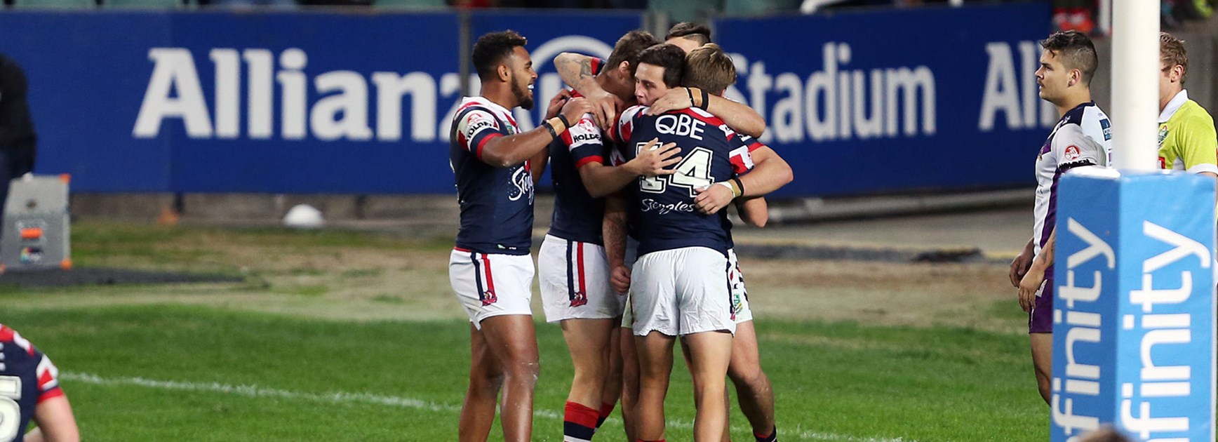 Roosters NYC players celebrate during their win over the Storm in Round 14.