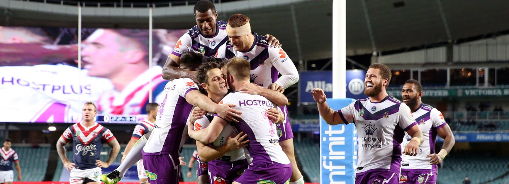Storm players celebrate during their monster win over the Roosters.