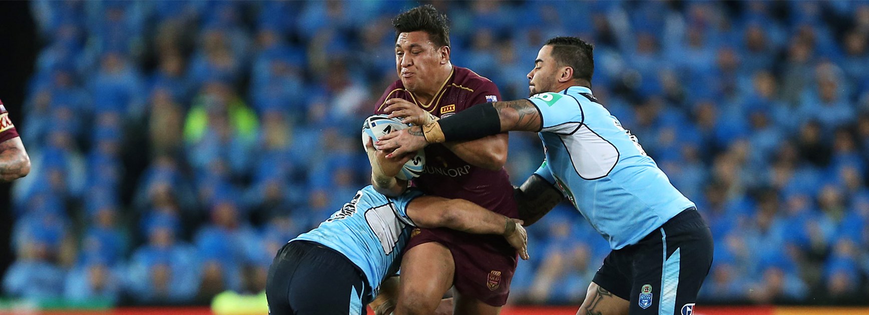 Queensland's Josh Papalii meets the Blues defence in State of Origin I in Sydney.