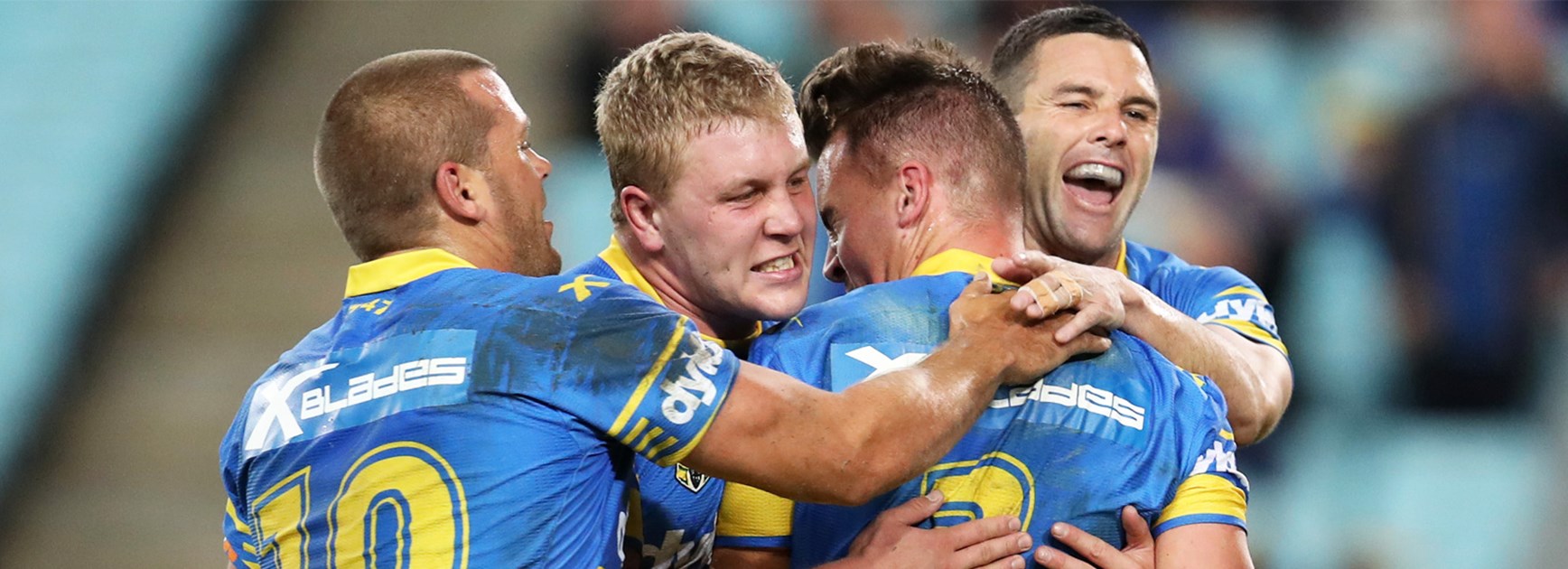 The Eels celebrate Clinton Gutherson's try against Souths on Friday night.