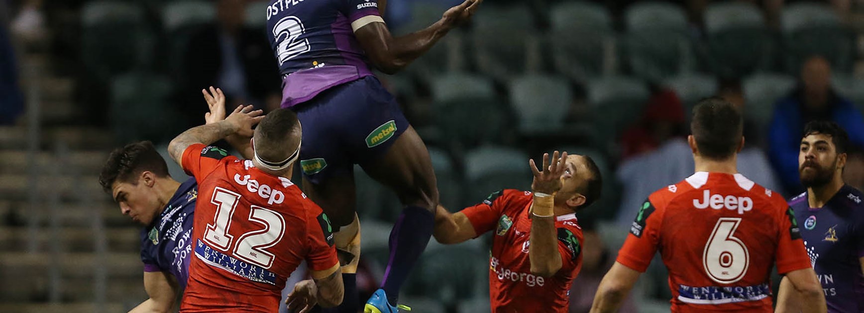 Suliasi Vunivalu flies above the Dragons defence during their Round 15 clash at WIN Stadium.